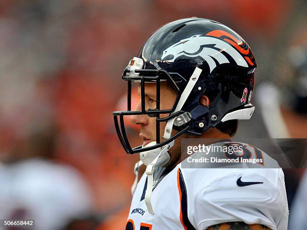 Tight end Owen Daniels of the Denver Broncos watches the action from the sideline during a game against the Cleveland Browns on October 18, 2015 at...