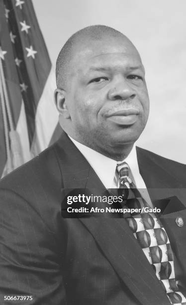 Portrait of politician and Maryland congressional representative Elijah Cummings, with an American flag, 1994.