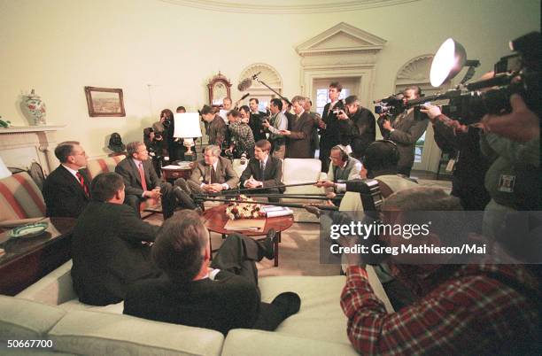 Members of White House Press Corps at meeting of President George W. Bush and members of Congress in the Oval Office.