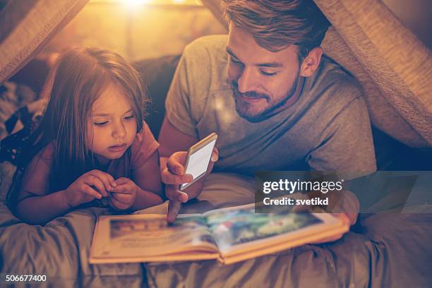 father and daughter enjoying at home. - love connection family stockfoto's en -beelden