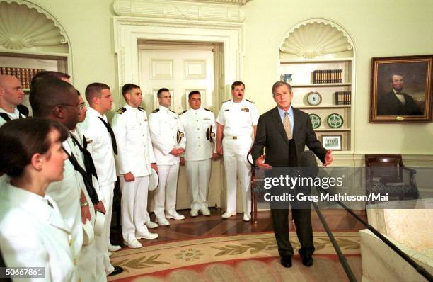 President George W. Bush giving speech in the Oval Office of the White House after greeting the crew of the Navy surveillance plane that was held on...