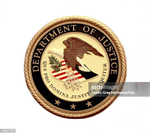 The seal of the US Department of Justice.