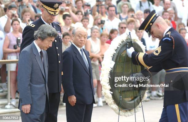 Japanese Prime Minister Junichiro Koizumi and Ambassador to the US, Shunj Yanai at wreath laying ceremony at the Tomb of the Unknowns at Arlington...