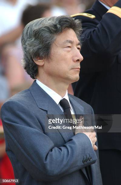 Japanese Prime Minister Junichiro Koizumi at wreath laying ceremony at the Tomb of the Unknowns at Arlington cemetery.