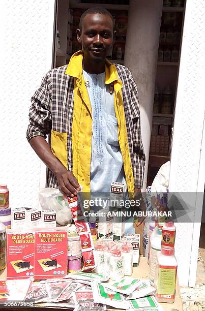 Vendor sells rat poison in northern Nigeria's largest city of Kano on January 20, 2016. Sales of rat poison have taken off in Nigeria following an...