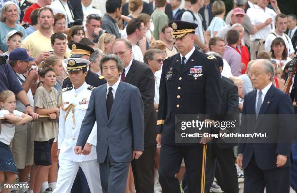 Japanese Prime Minister Junichiro Koizumi and Ambassador to the US, Shunj Yanai at wreath laying ceremony at the Tomb of the Unknowns at Arlington...