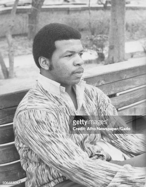 Portrait of politician and Maryland congressional representative Elijah Cummings sitting on a bench, 1975.
