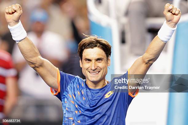 David Ferrer of celebrates winning his fourth round match against John Isner of the United States during day eight of the 2016 Australian Open at...
