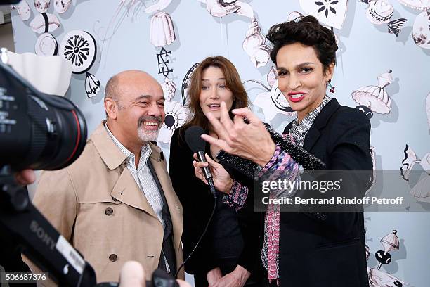 Stylist Christian Louboutin, Singer Carla Bruni Sarkozy and Ambassador of the house Schiaparelli, Farida Khelfa attend the Schiaparelli Haute Couture...