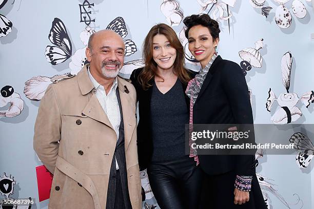 Stylist Christian Louboutin, Singer Carla Bruni Sarkozy and Ambassador of the house Schiaparelli, Farida Khelfa attend the Schiaparelli Haute Couture...