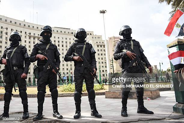 Members of the Egyptian police special forces stand guard on Cairo's landmark Tahrir Square on January 25 as the country marks the fifth anniversary...