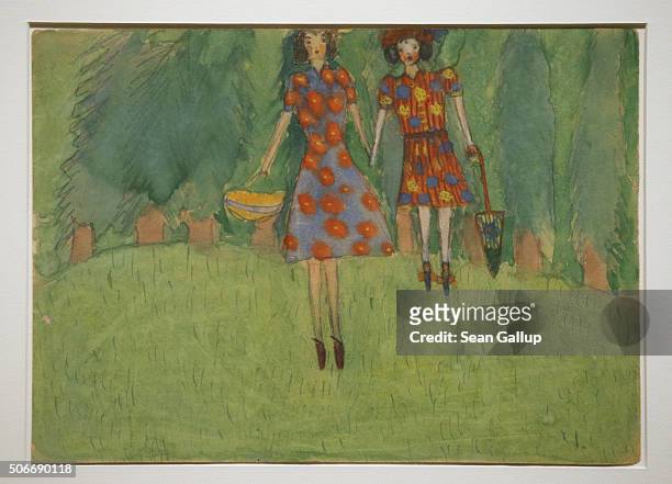 The gouache "Girls In The Field" by Nelly Toll, which she painted as a child while living in the Lviv ghetto during World War II, hangs on display at...