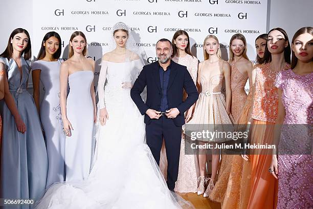 Designer Georges Hobeika is pictured with models after his Haute Couture show Spring/Summer 2016 Fashion Show as part of Paris Fashion Week at...