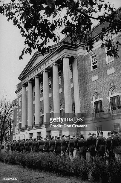 Federal troops on campus of the University of Alabama re Autherine Lucy, first African American to enter the University of Alabama. Her challenge to...