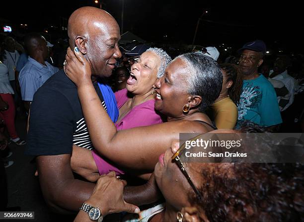 Keith Christopher Rowley , Prime Minister of Trinidad & Tobago, greets admirers in the audience at the semi-finals of Panorama in the Queen's Park...