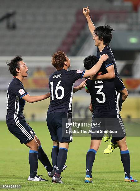 Shoya Nakajima of Japan celebrates scoring a goal with his team mates during the AFC U-23 Championship quarter final match between Japan and Iran at...