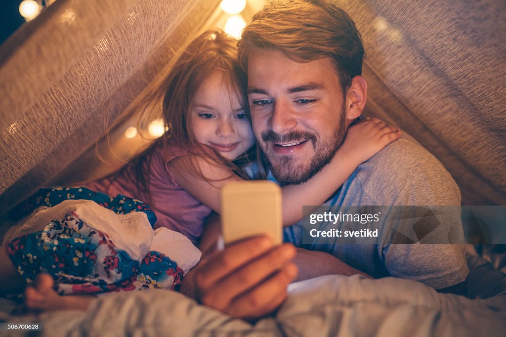 Father and daughter enjoying at home.