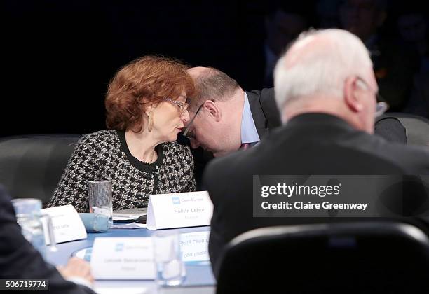 Former Deputy Finance Minister of Germany, Steffan Kampeter and former French Minister of European Affairs, Noelle Lenoir, share a private word at...