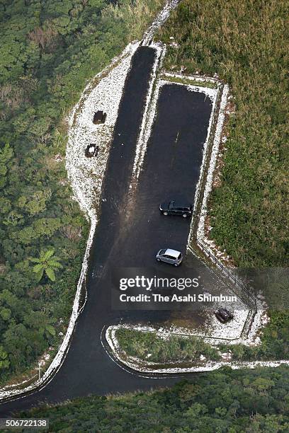 In this aerial image, the observation point of the summit of Mount Yuwandake is covered with snow at Amami Oshima Island on January 25, 2016 in...