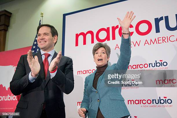 Republican presidential candidate Sen. Marco Rubio campaigns with Sen. Joni Ernst at a rally on January 25, 2016 in Des Moines, Iowa. Rubio is in...