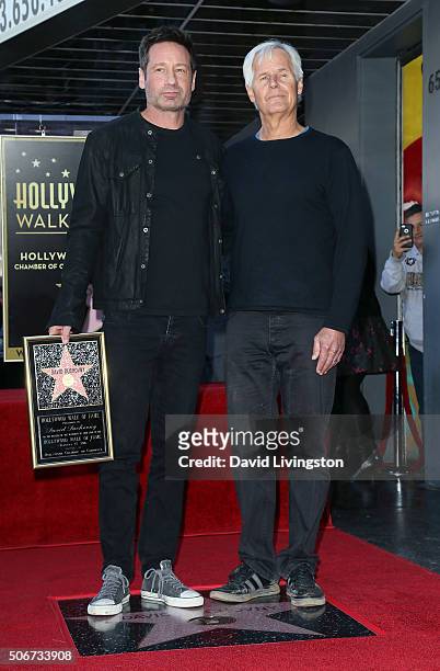 Actor David Duchovny and producer Chris Carter attend David Duchovny being honored with a Star on the Hollywood Walk of Fame on January 25, 2016 in...