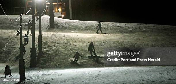 Skiers and snowboarders take to Powderhouse Hill in South Berwick on Wednesday, January 20, 2016. The small community ski hill is popular with locals...