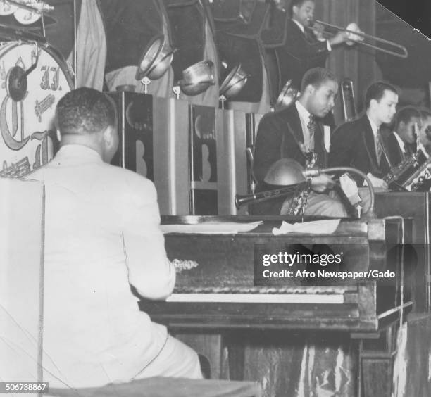 African-American jazz musician Count Basie and a Jazz orchestra, December 17, 1938.