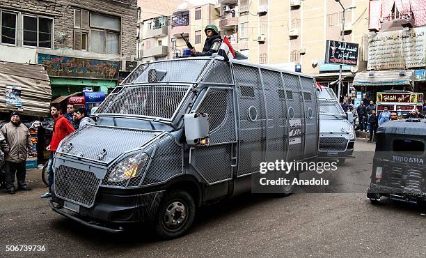 Police take security measueres to prevent the protests against military regime on the 5th anniversary of Egyptian revolution in 2011, in Haram...