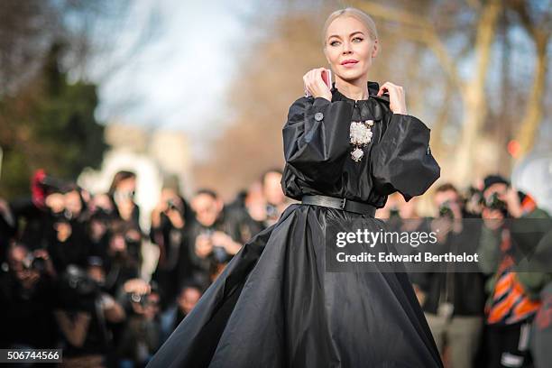 Ulyana Sergeenko wearing a Ulyana Sergeenko dress after the Dior show, during Paris Fashion Week, Haute Couture Spring Summer 16 on January 25, 2016...