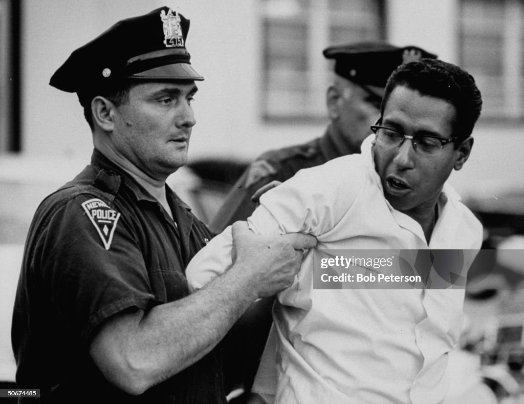 Policeman arresting a suspect during rio