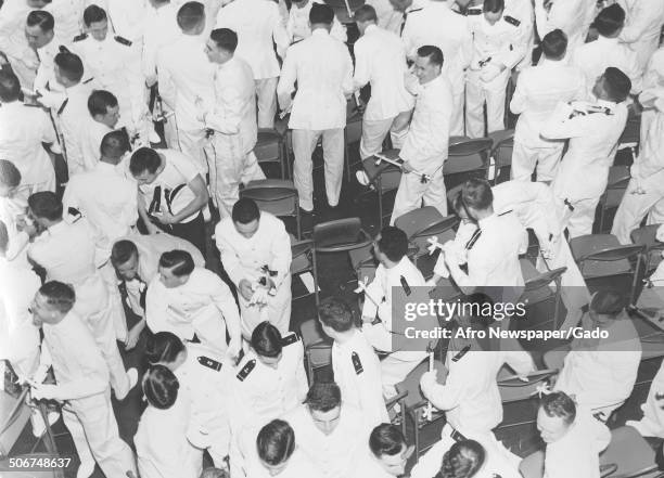 United States Navy cadets at the United States Naval Academy during a graduation ceremony, Annapolis, Maryland, 1970.