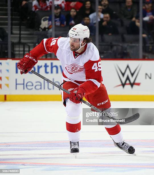 Eric Tangradi of the Detroit Red Wings skates in his first game with the team against the New York Islanders at the Barclays Center on January 25,...