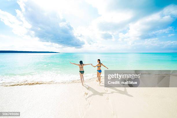 beach girl - miyakojima stock pictures, royalty-free photos & images