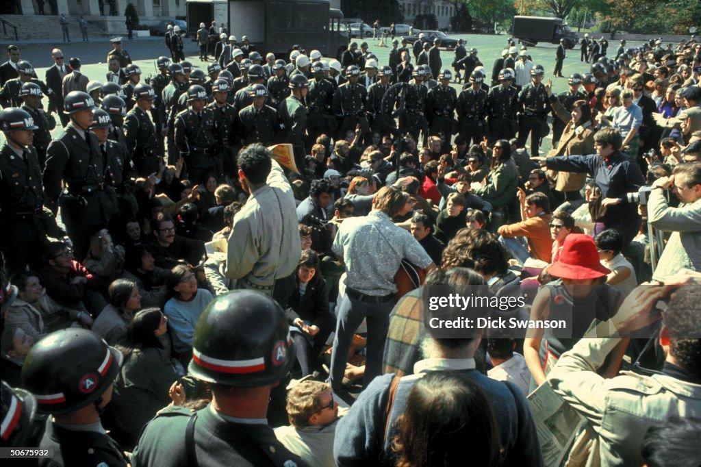 Antiwar protestors confronting cordon of