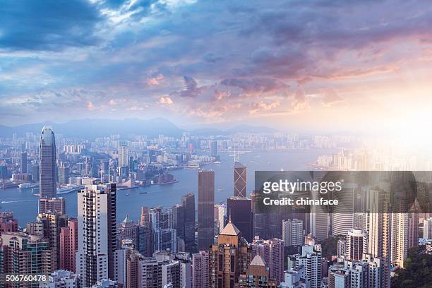 hong kong in sunset - victoria hong kong stock pictures, royalty-free photos & images