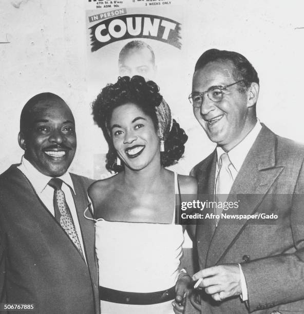 African-American jazz musician Count Basie, singer Sarah Vaughan and Benny Goodman, New York City, New York, October 9, 1948.