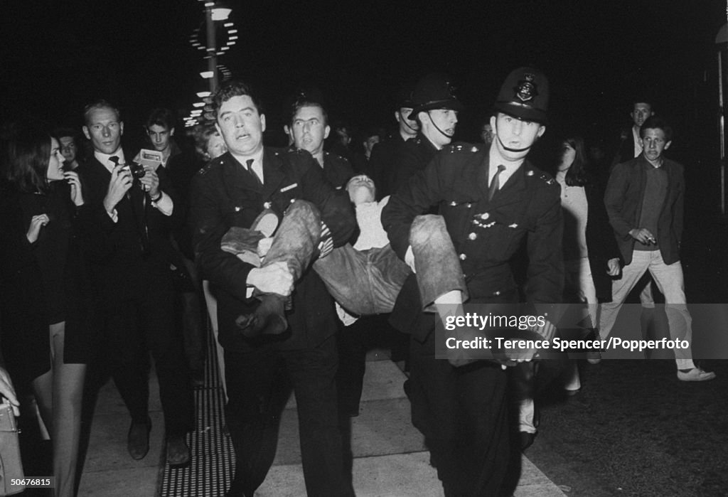 Mini Rocker Convict Police arresting a Rocker during clashes between Rockers and their ...