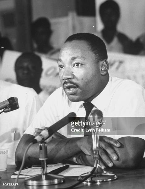 Reverend Martin Luther King, Jr. , testifying at trial during racial strife.