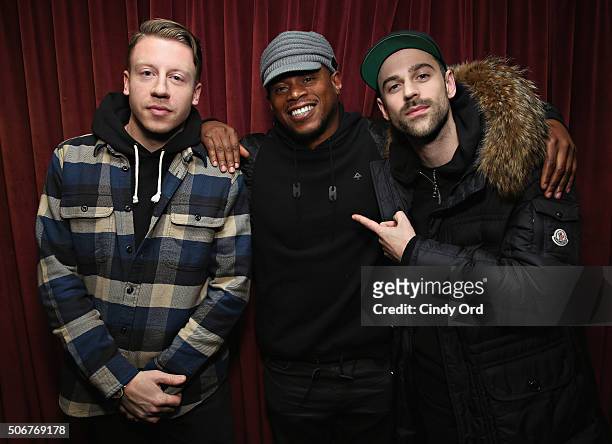 Macklemore and Ryan Lewis pose with SiriusXM host Sway Calloway during a visit to the SiriusXM Studios on January 25, 2016 in New York City.