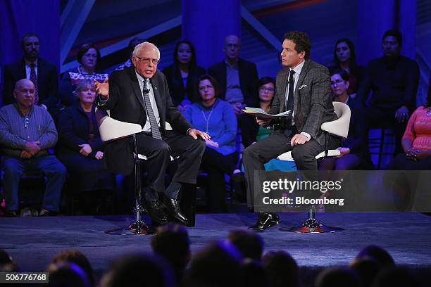 Senator Bernie Sanders, an independent from Vermont and 2016 Democratic presidential candidate, left, speaks with moderator Chris Cuomo during a town...