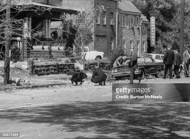 Agents investigate the aftermath of the 16th Street Baptist Church bombing, Birmingham, Alabama, September 16, 1963.