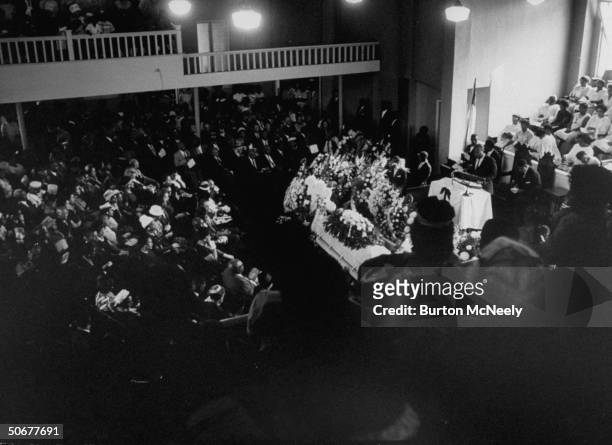 View of the crowded funeral service being held for one of the victims of the 16th Street Baptist Church bombing, Birmingham, Alabama, late September...