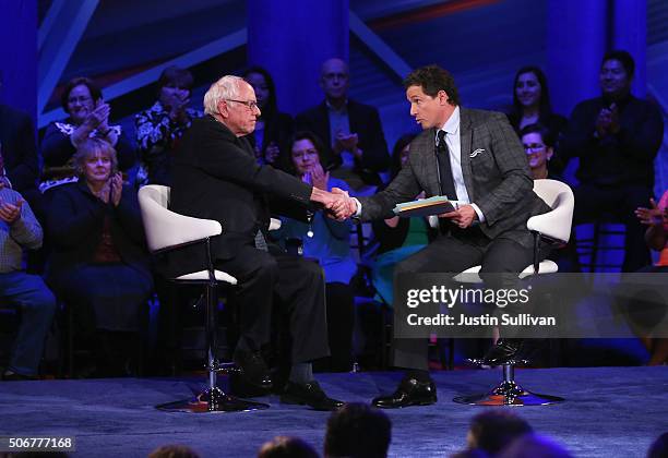 Democratic presidential candidate Senator Bernie Sanders participates in a town hall forum with moderator Chris Cuomo which is hosted by CNN at Drake...