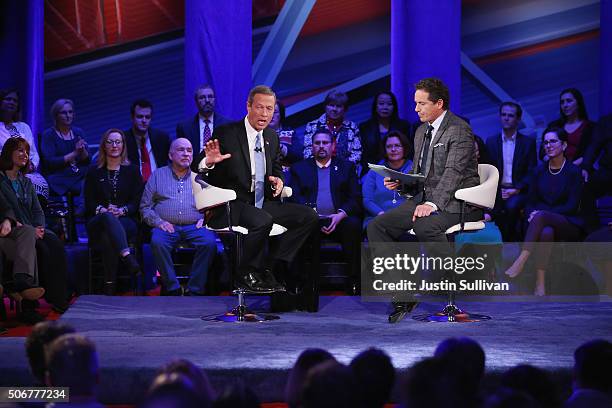 Democratic presidential candidate Martin O'Malley and moderator Chris Cuomo participate in a town hall forum hosted by CNN at Drake University on...