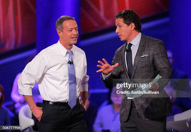 Democratic presidential candidate Martin O'Malley and moderator Chris Cuomo participate in a town hall forum hosted by CNN at Drake University on...