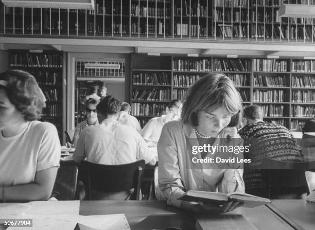 Students studying at seminar of Slavic language in library at Munich University.