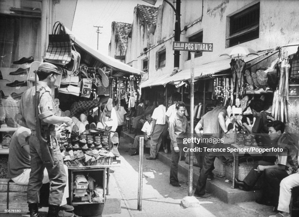 Open-front stores on city street. News Photo - Getty Images