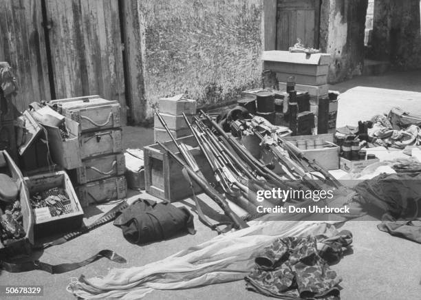 Weapons taken from home of guatemalan presidential candidate Roberto Alejos, during recent coup d'etat.