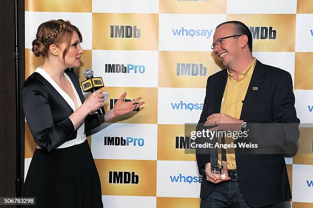 Founder and CEO of IMDb Col Needham presents Bryce Dallas Howard with an IMDb STARmeter Award on January 25, 2016 in Park City, Utah.