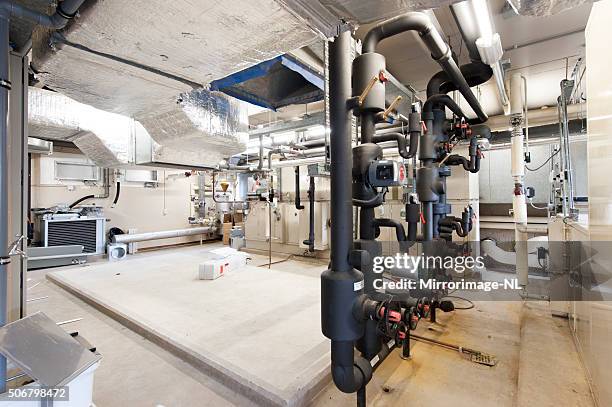 room with technical equipment and heating system in office building - compressor stock pictures, royalty-free photos & images